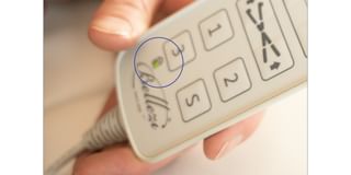 1a. | The light on the hand control is flashing. This means the bed is in safe/safety mode.